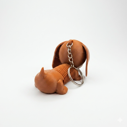 Llavero juguete perrito flexi
