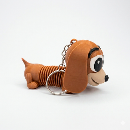 Llavero juguete perrito flexi